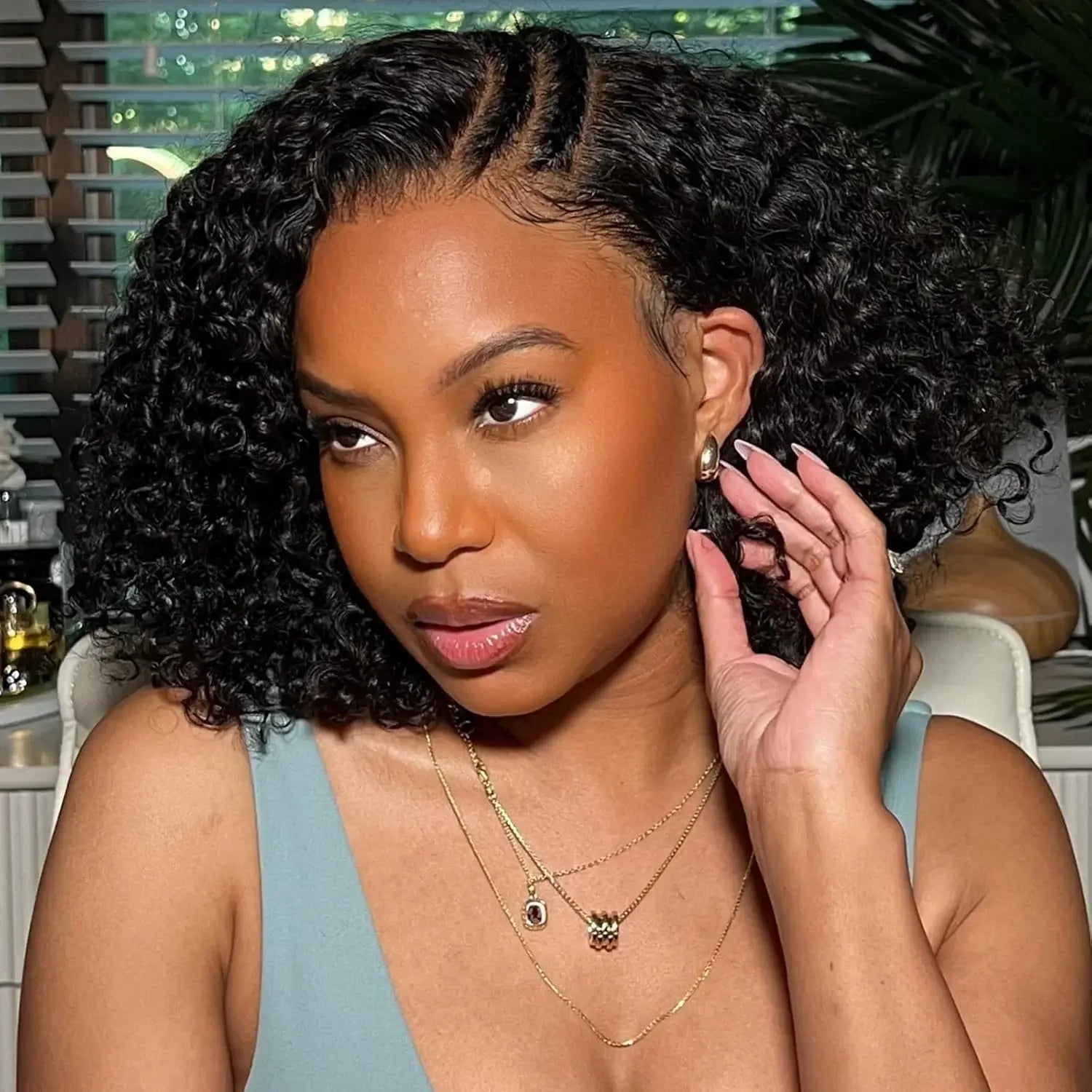 Brazilian HD Lace Curly Bob Wig – Short, Full & Flawless styled on a woman with natural makeup and accessories.
